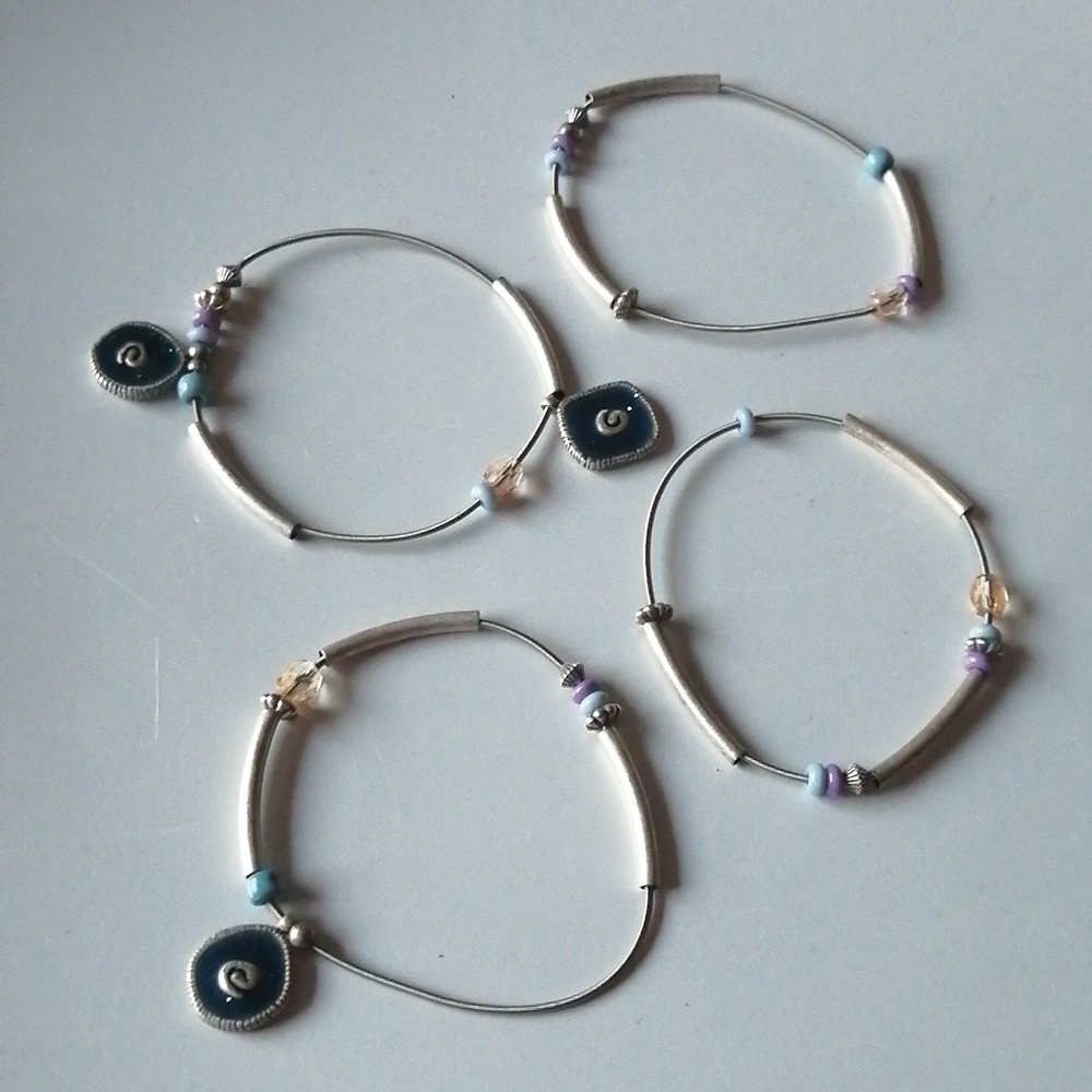 💥2/$25💥Avon 2008 Stackable Stretch Bracelets Set of 4 - Picture 2 of 5